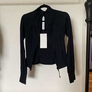 Brand new never worn Lulu Lemon work out jacket in a size 4